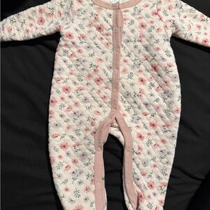 Various baby onesies